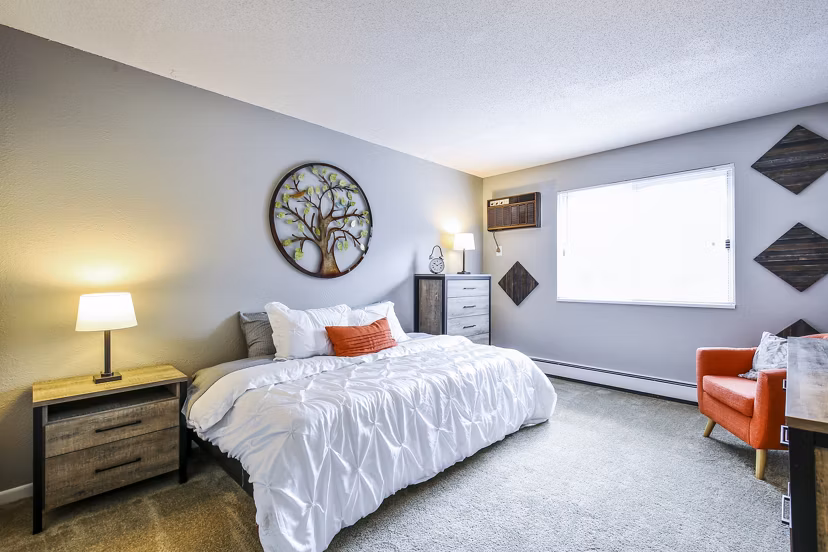 Cozy bedroom with modern furnishings in Avana West Park Apartments