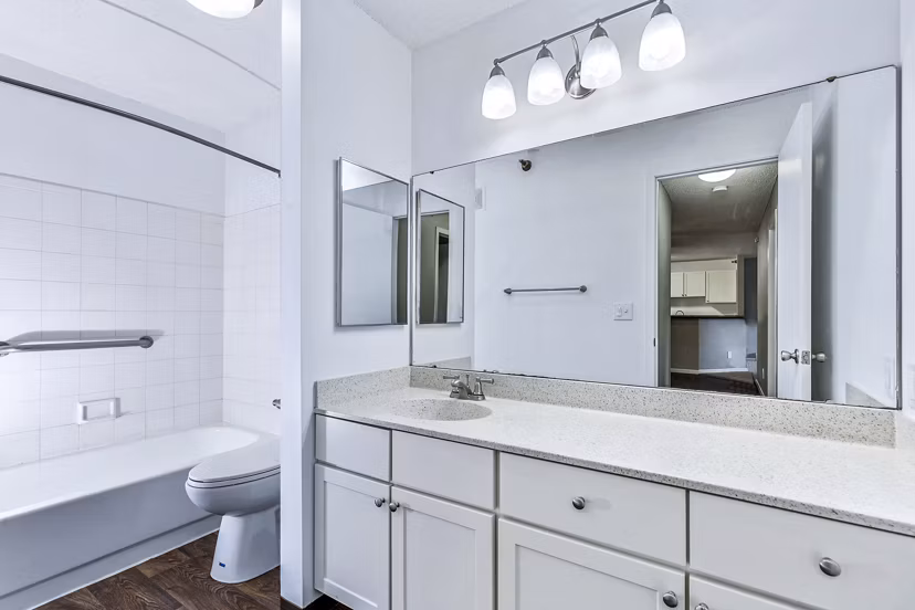 Stylish bathroom featuring modern fixtures and elegant design at Avana West Park Apartments