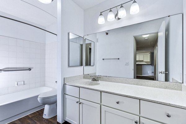 Stylish bathroom featuring modern fixtures and elegant design at Avana West Park Apartments