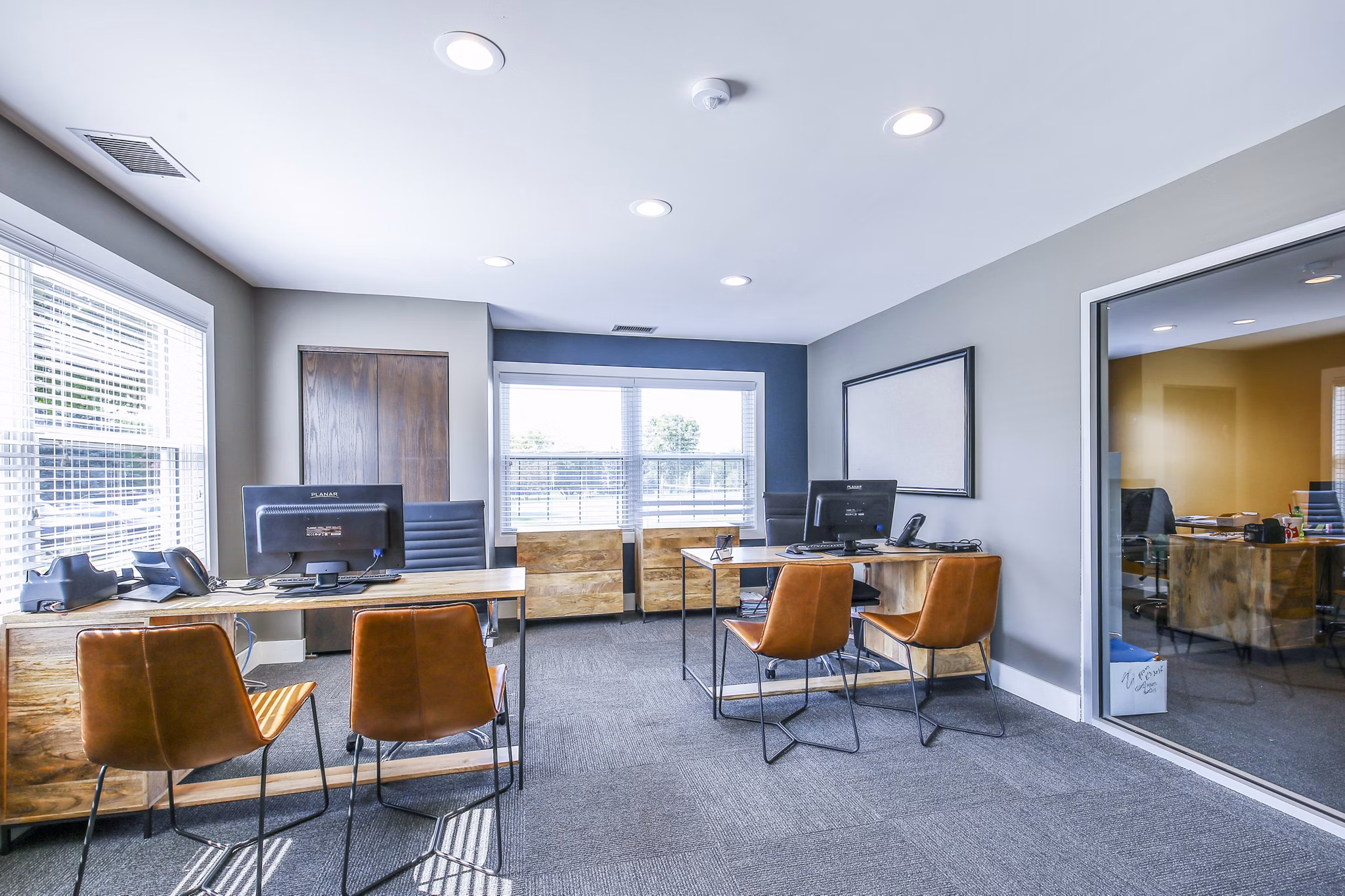 Elegant clubhouse and leasing office at Avana West Park Apartments, featuring modern design and comfortable seating in Houston Ideal for community events