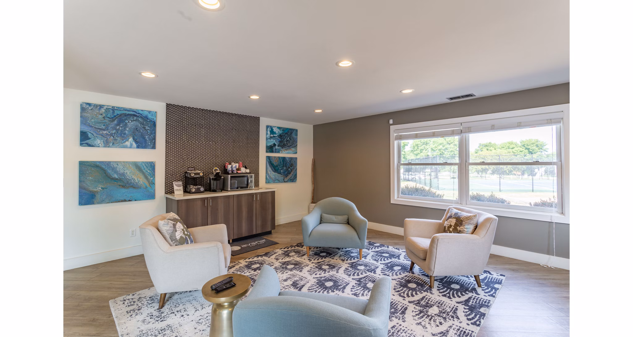 Clubhouse featuring modern design elements at Avana West Park Apartments, offering residents a stylish space for socializing and relaxation