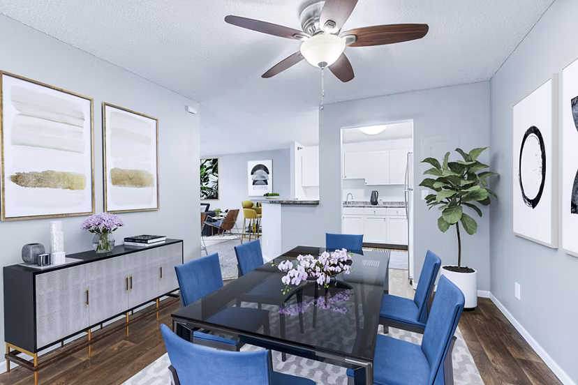 Dining room at Avana West Park Apartments featuring modern decor and elegant lighting for a luxurious living experience