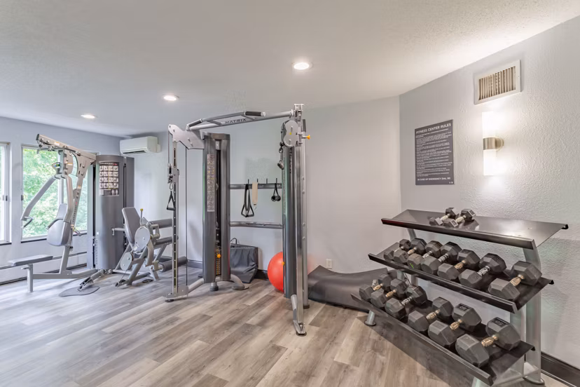 State-of-the-art fitness center at Avana West Park Apartments featuring modern equipment for a comprehensive workout experience
