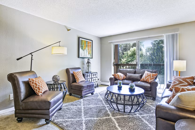 Spacious living room with modern decor in Avana West Park Apartments