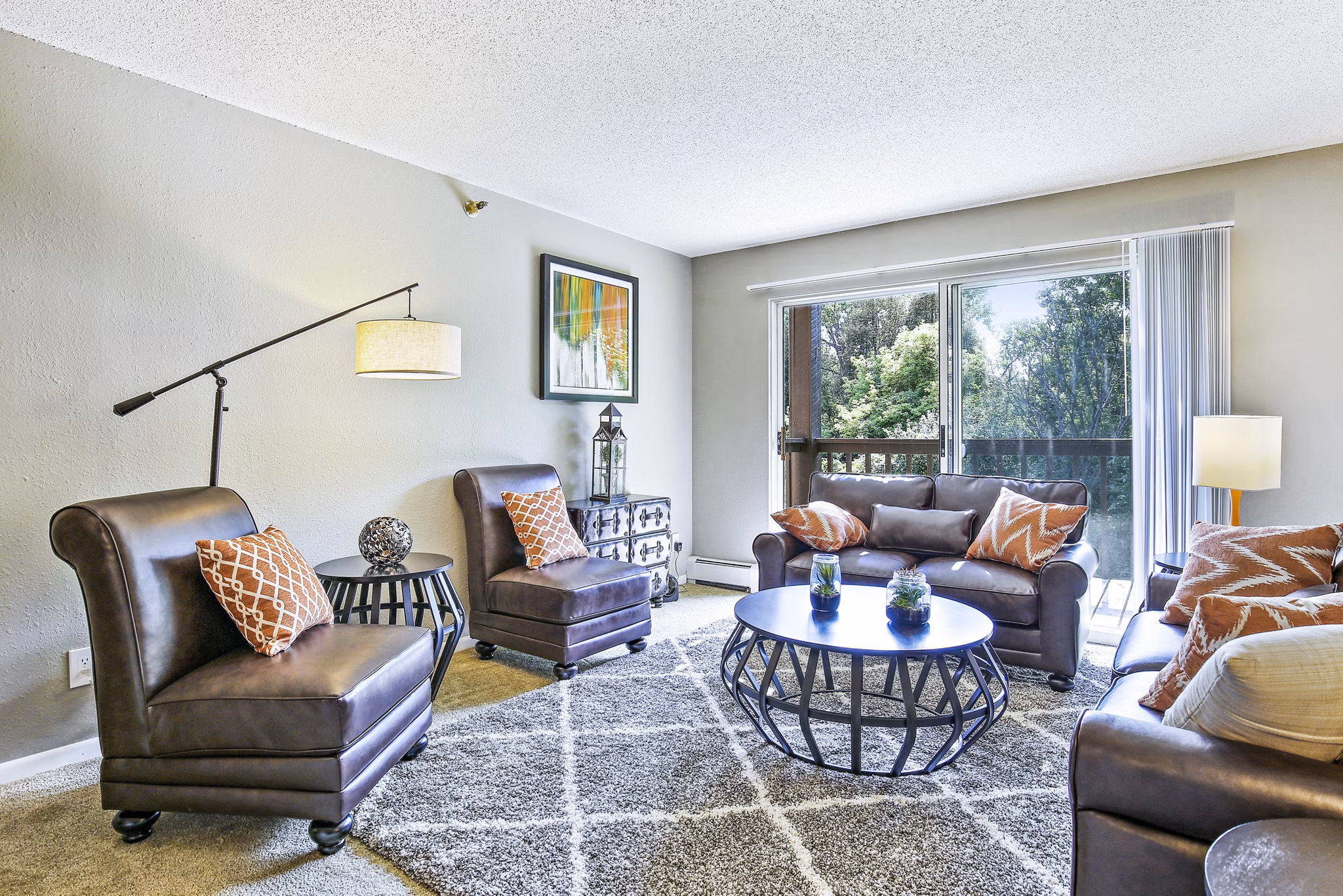 Spacious living room with modern decor in Avana West Park Apartments