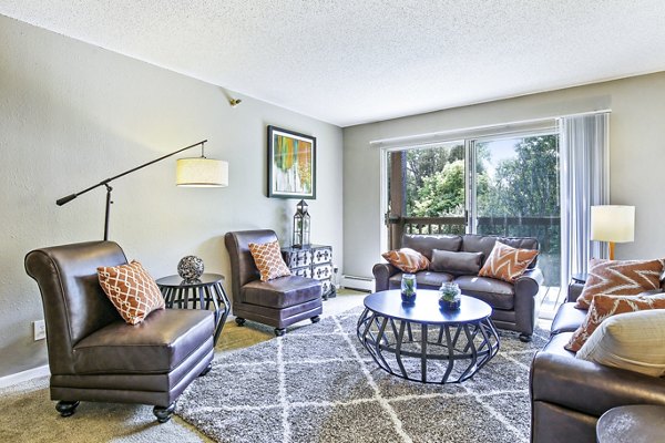 Spacious living room with modern decor in Avana West Park Apartments