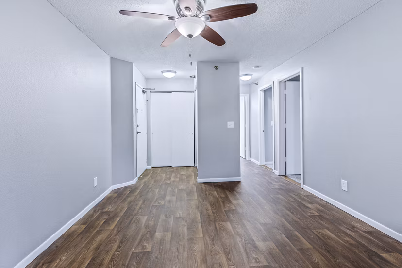 Spacious living room with modern decor and natural light in Avana West Park Apartments