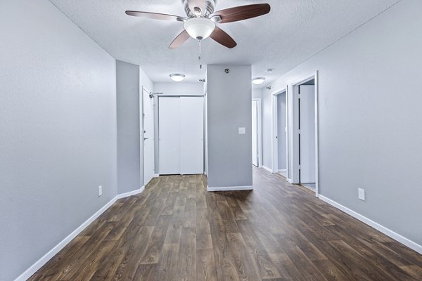 Spacious living room with modern decor and natural light in Avana West Park Apartments