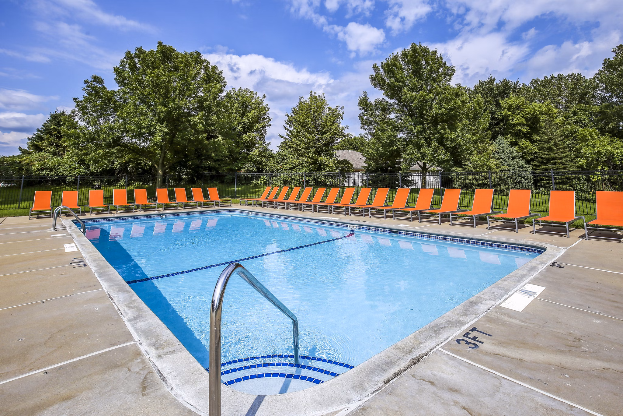 â€œModern outdoor pool at Avana West Park Apartments offering relaxation and recreation for residentsâ€