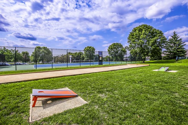 Outdoor sport courts at Avana West Park Apartments featuring basketball and tennis facilities for active living enthusiasts