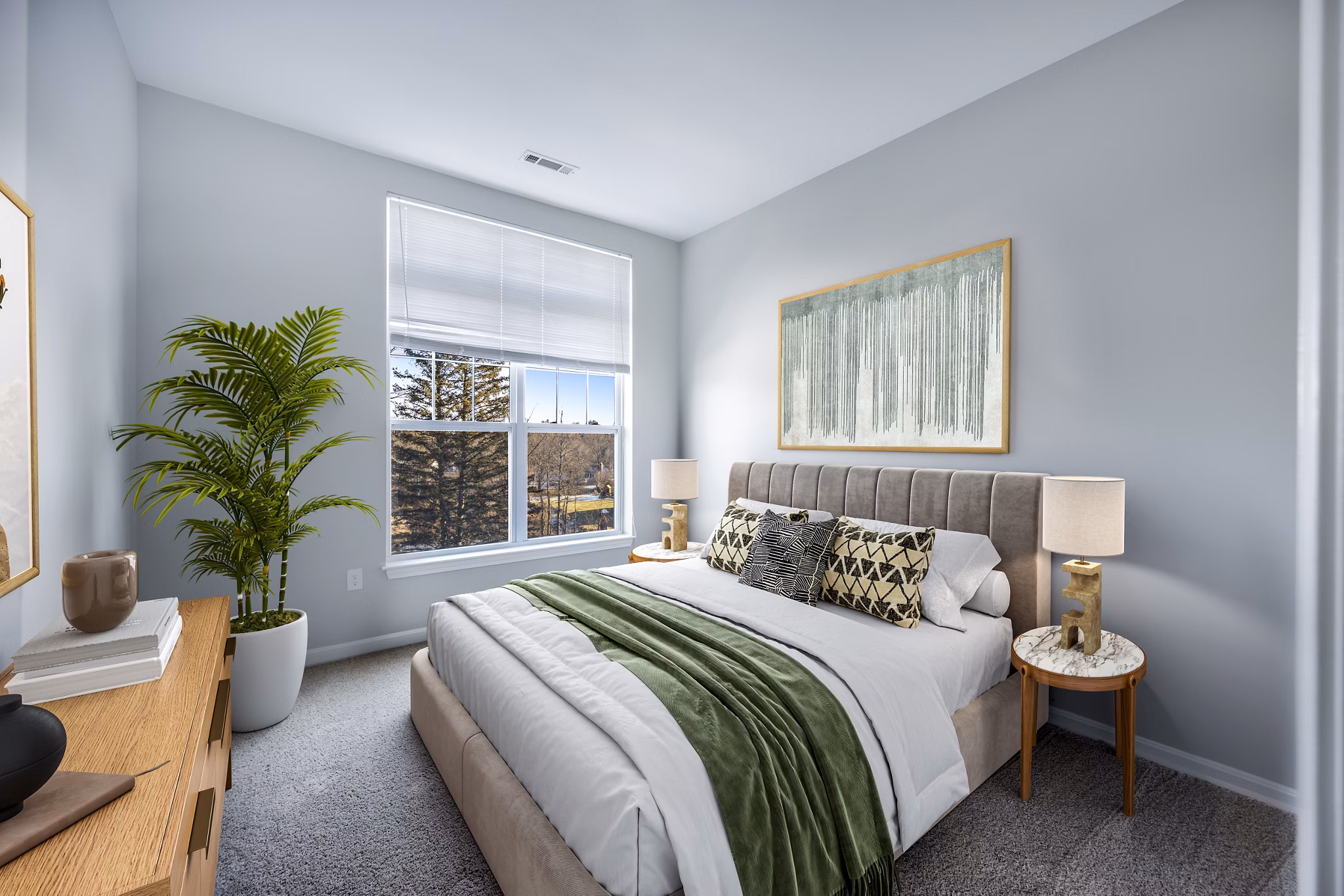 Cozy bedroom with modern furnishings at Marquee at Andover Apartments, offering luxury living spaces for residents seeking comfort and style