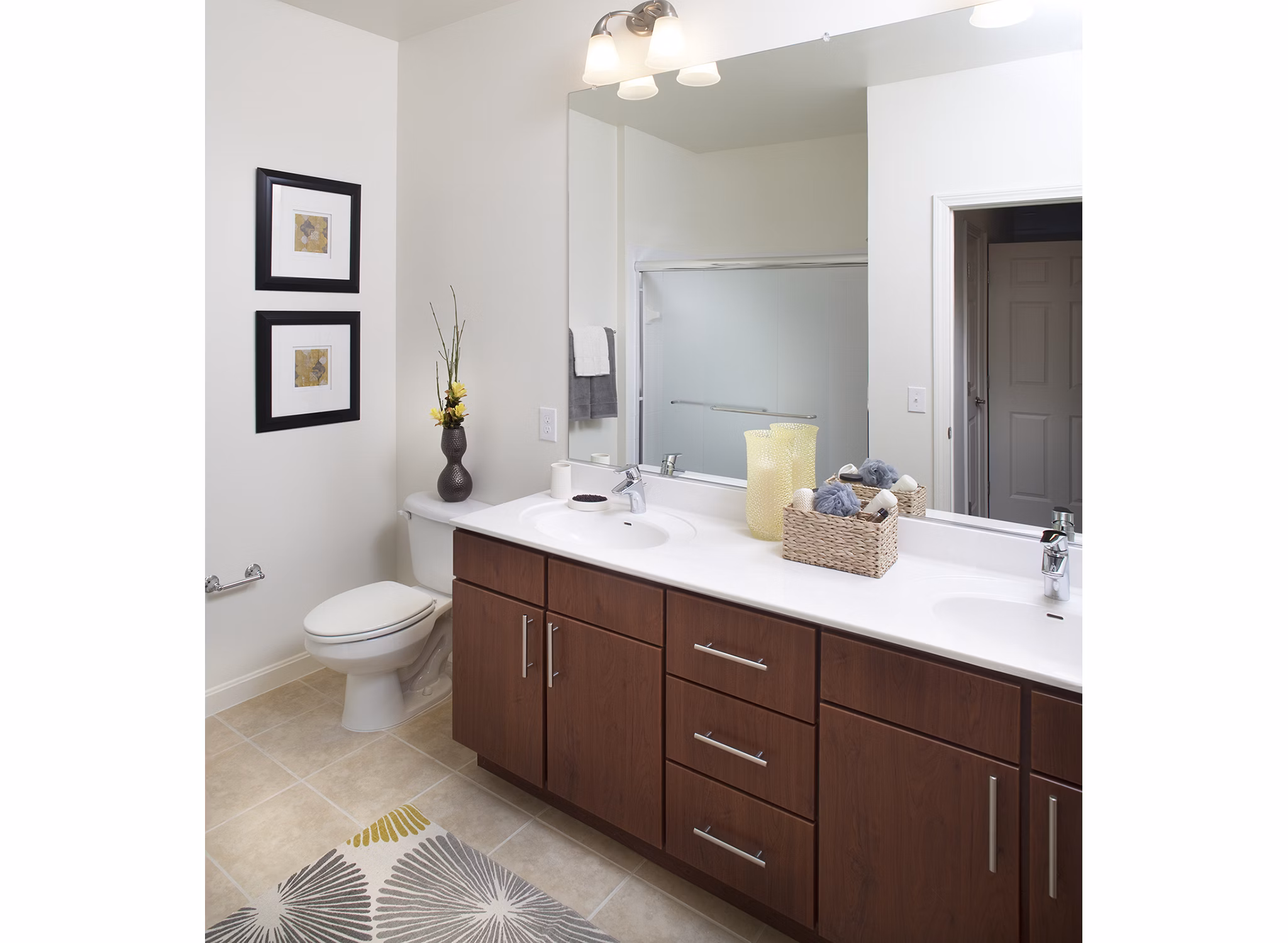 Bathroom featuring modern fixtures and granite countertops at Marquee at Andover Apartments