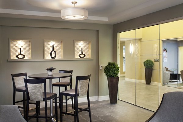 Clubhouse featuring modern design and amenities at Marquee at Andover Apartments, ideal for community gatherings and leisure activities