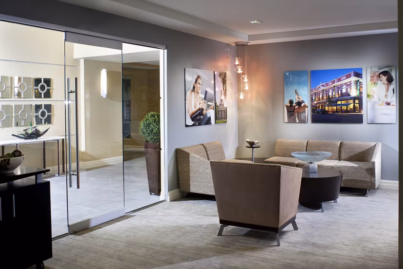Clubhouse featuring modern design and spacious seating at Marquee at Andover Apartments