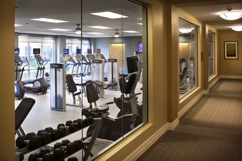 State-of-the-art fitness center with modern equipment at Marquee at Andover Apartments offering luxury living amenities