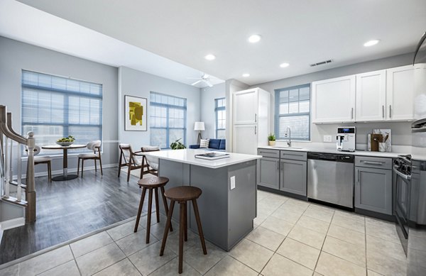 Modern kitchen with stainless steel appliances at Marquee at Andover Apartments