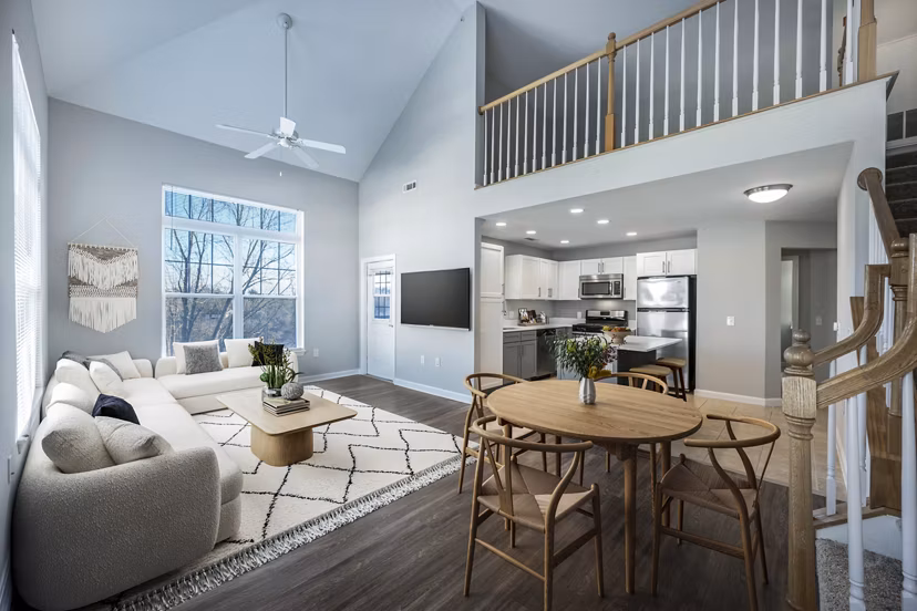 Spacious living room with modern furnishings at Marquee at Andover Apartments