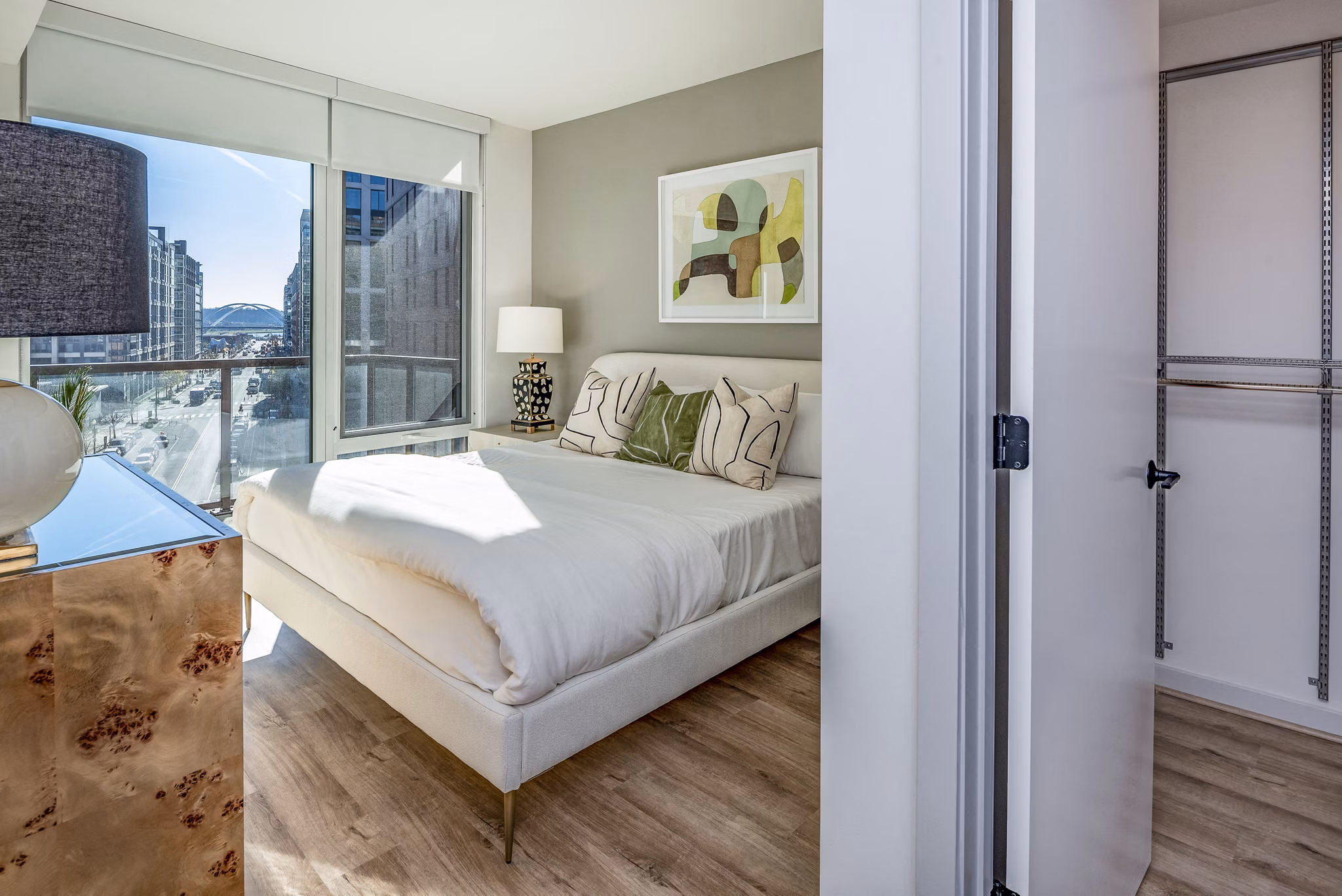 Modern bedroom with stylish decor at Illume Apartments, offering a luxurious living experience in a Greystar managed property