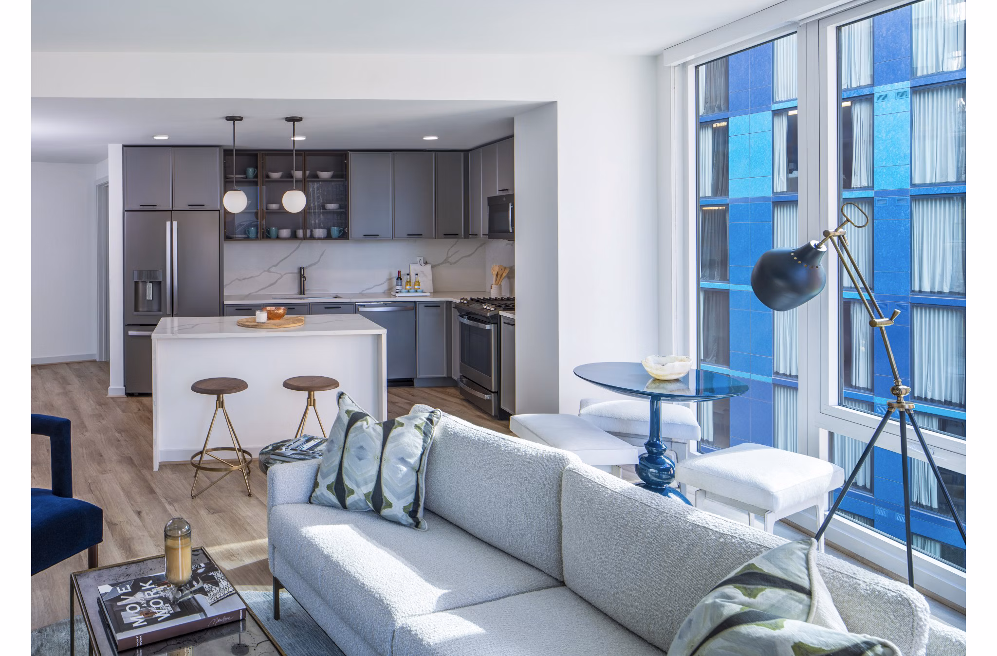 Spacious living room with modern decor in Illume Apartments, offering comfort and style in luxury urban living spaces