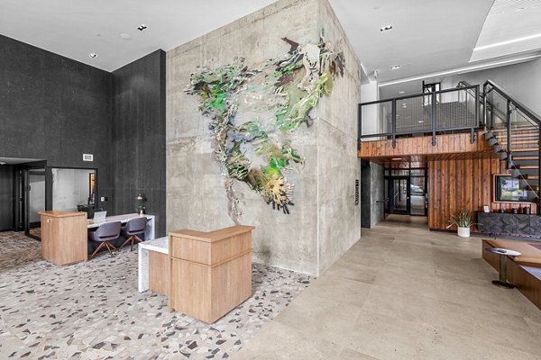 Elegant clubhouse at Verde Esterra Park Apartments, featuring modern design and comfortable seating areas for social gatherings in Redmond