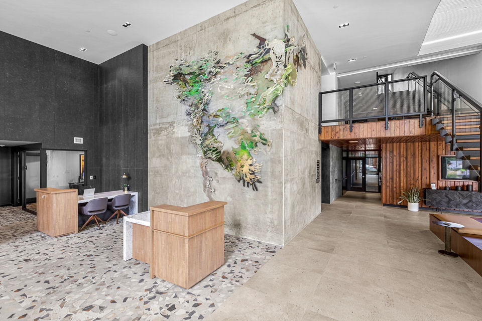 Elegant clubhouse at Verde Esterra Park Apartments, featuring modern design and comfortable seating areas for social gatherings in Redmond