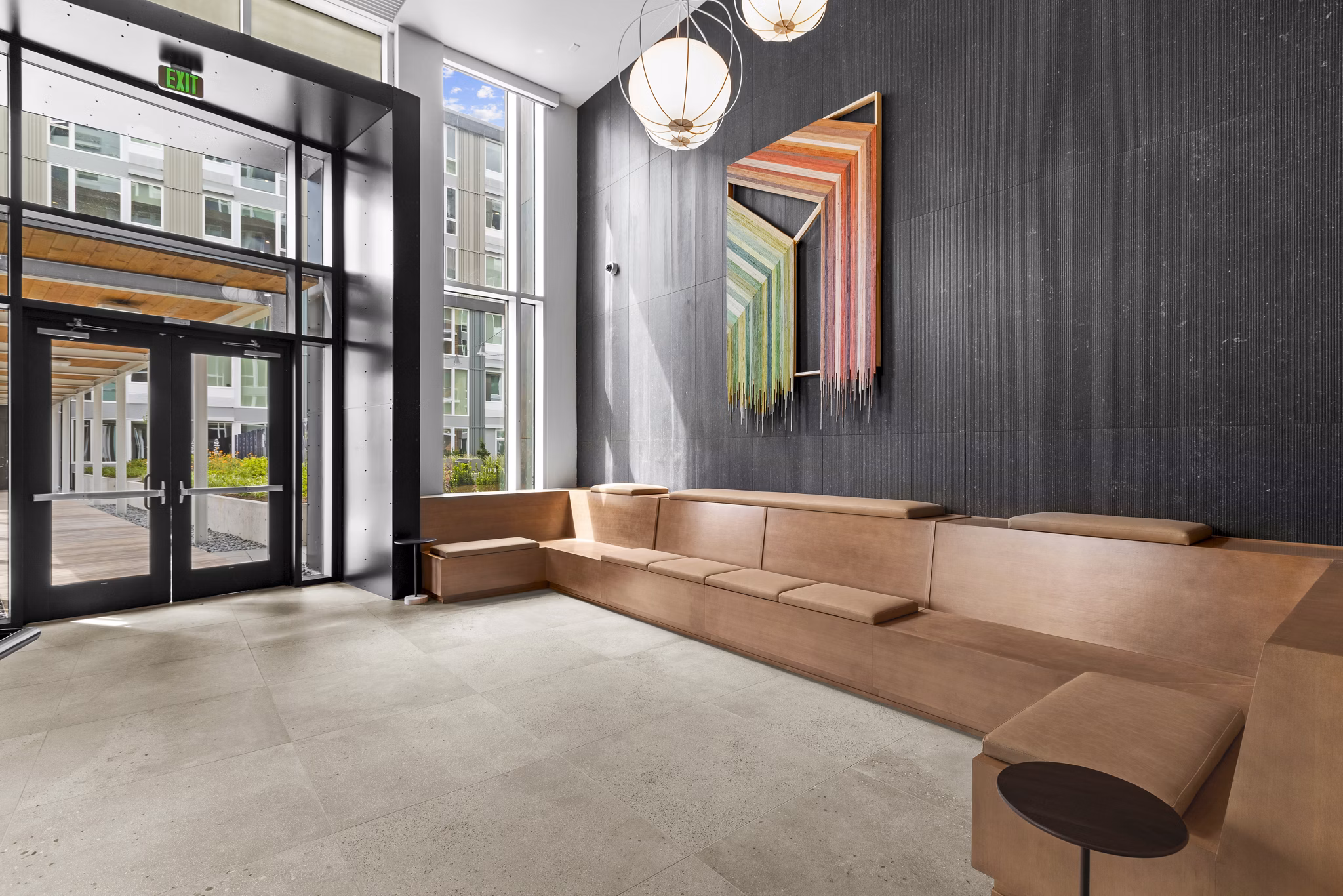 Clubhouse with modern interiors and cozy seating at Verde Esterra Park Apartments