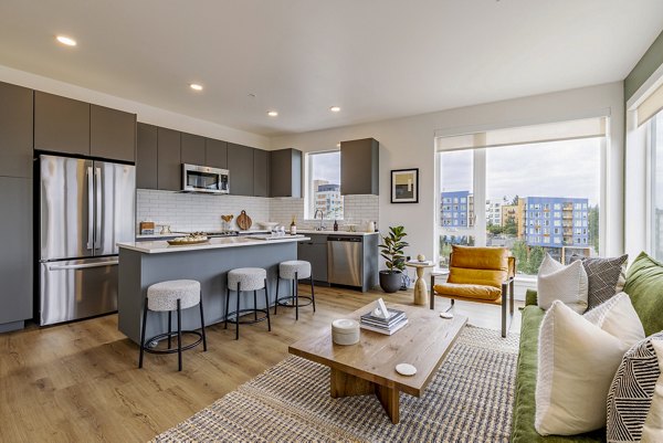 Spacious living room with modern furnishings in Verde Esterra Park Apartments, perfect for luxury living near Seattle's tech hub