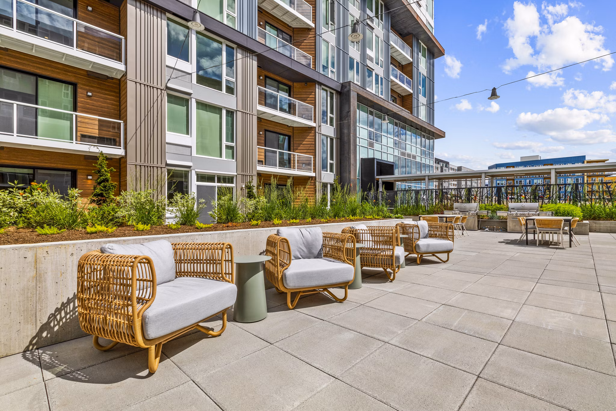 Outdoor grill area and patio at Verde Esterra Park Apartments