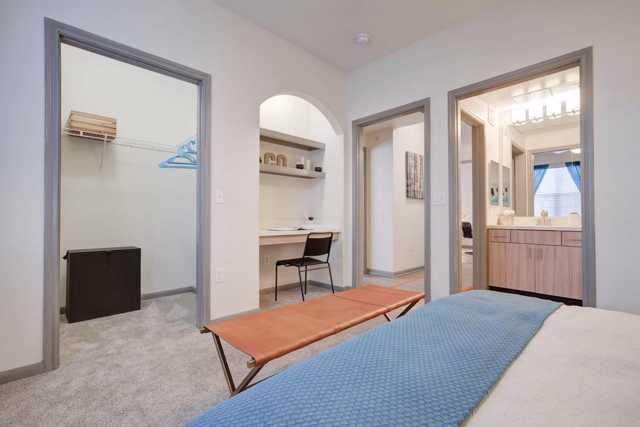 Bedroom featuring modern design and cozy decor at Prosper Place Apartments