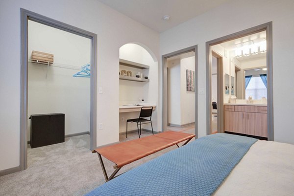 Bedroom featuring modern design and cozy decor at Prosper Place Apartments