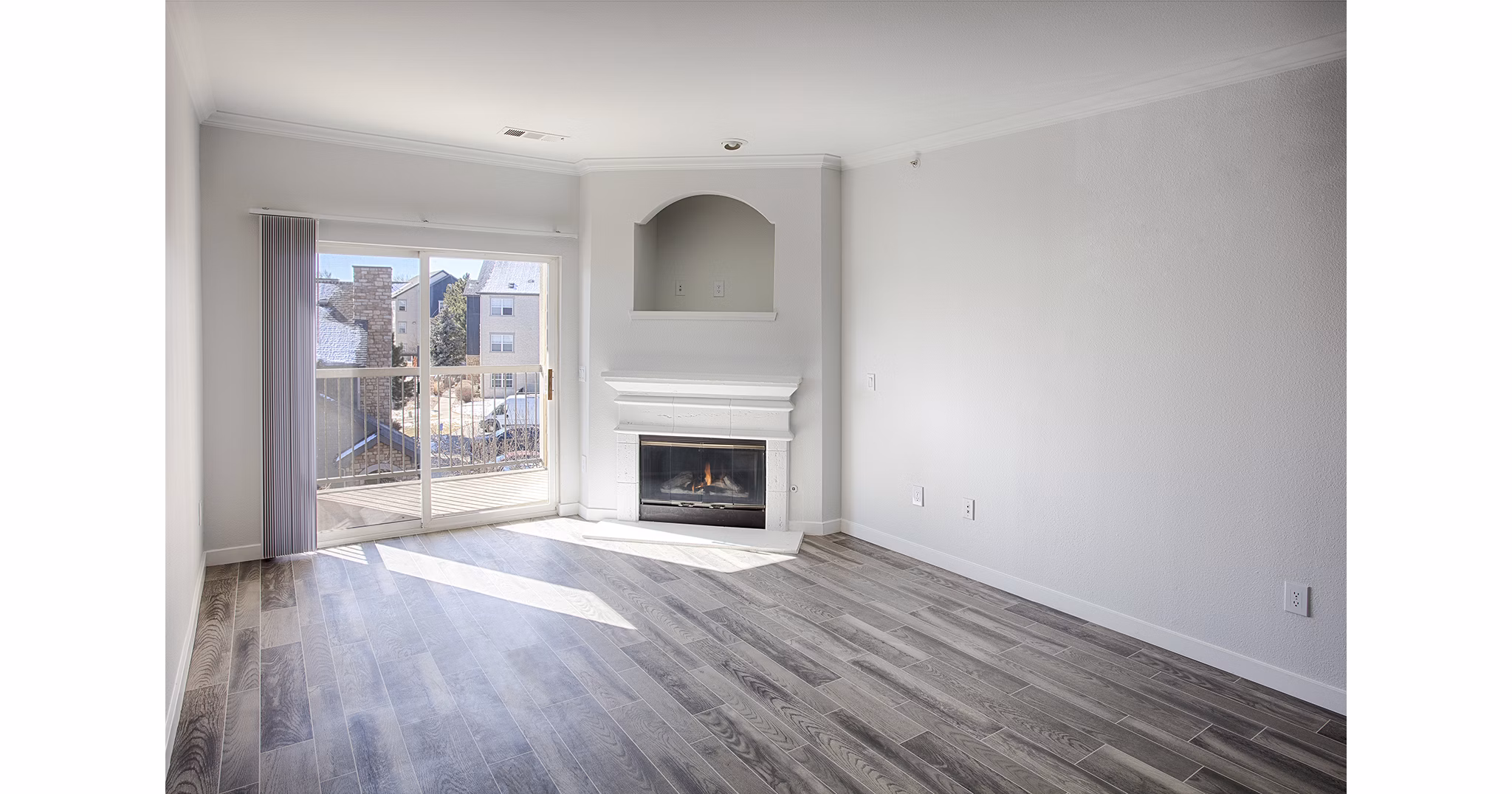 Spacious living room with modern furniture at Prosper Place Apartments