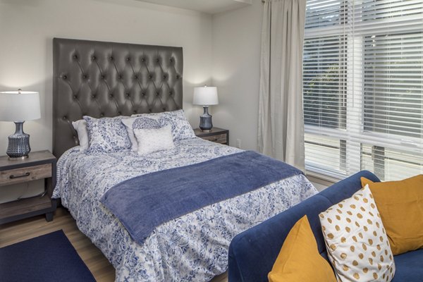 Modern bedroom with stylish decor at The Dylan Apartments