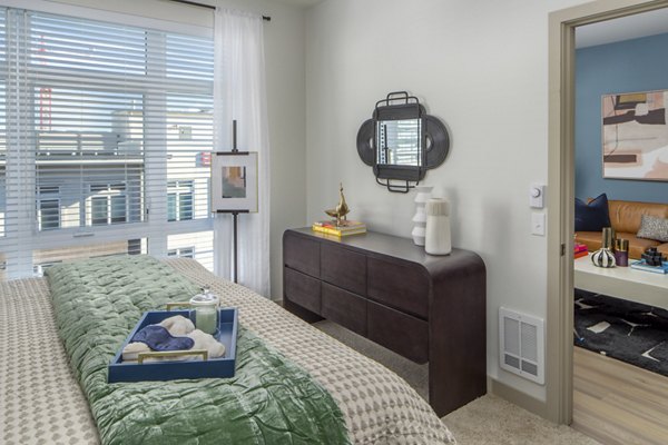 Cozy bedroom with modern decor at The Dylan Apartments