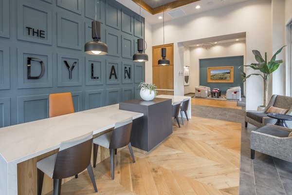 Clubhouse with modern decor and seating areas at The Dylan Apartments offering a luxury living experience