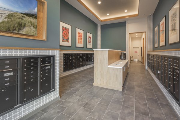 Modern mail room with secure package lockers at The Dylan Apartments, a luxury Greystar property