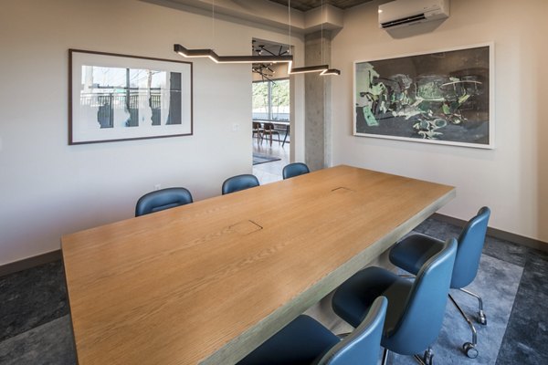Modern meeting facility with stylish furnishings at The Dylan Apartments, perfect for business gatherings in a luxury environment