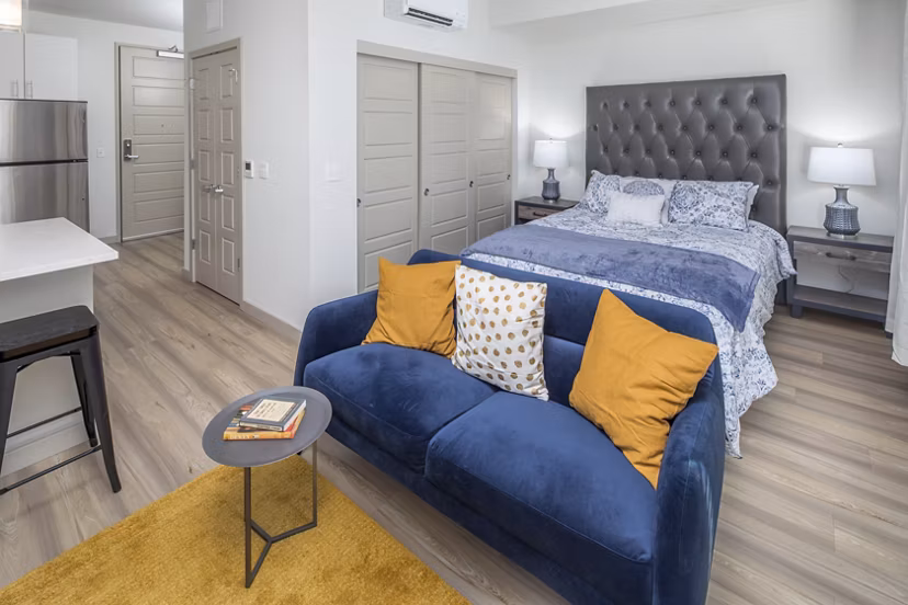Modern kitchen with stainless steel appliances in The Dylan Apartments, offering luxury living spaces for contemporary city living