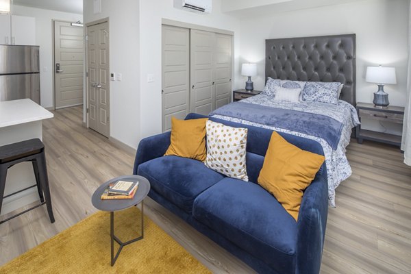 Modern kitchen with stainless steel appliances in The Dylan Apartments, offering luxury living spaces for contemporary city living