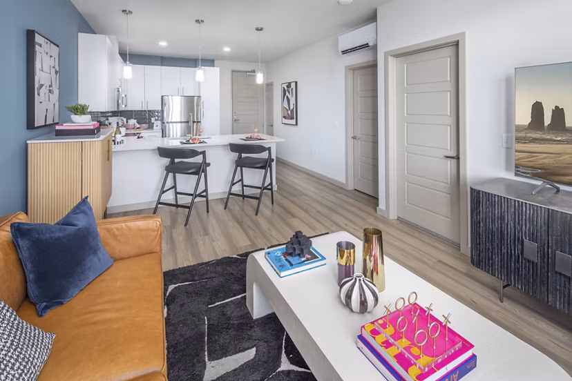 Spacious living room with modern decor at The Dylan Apartments