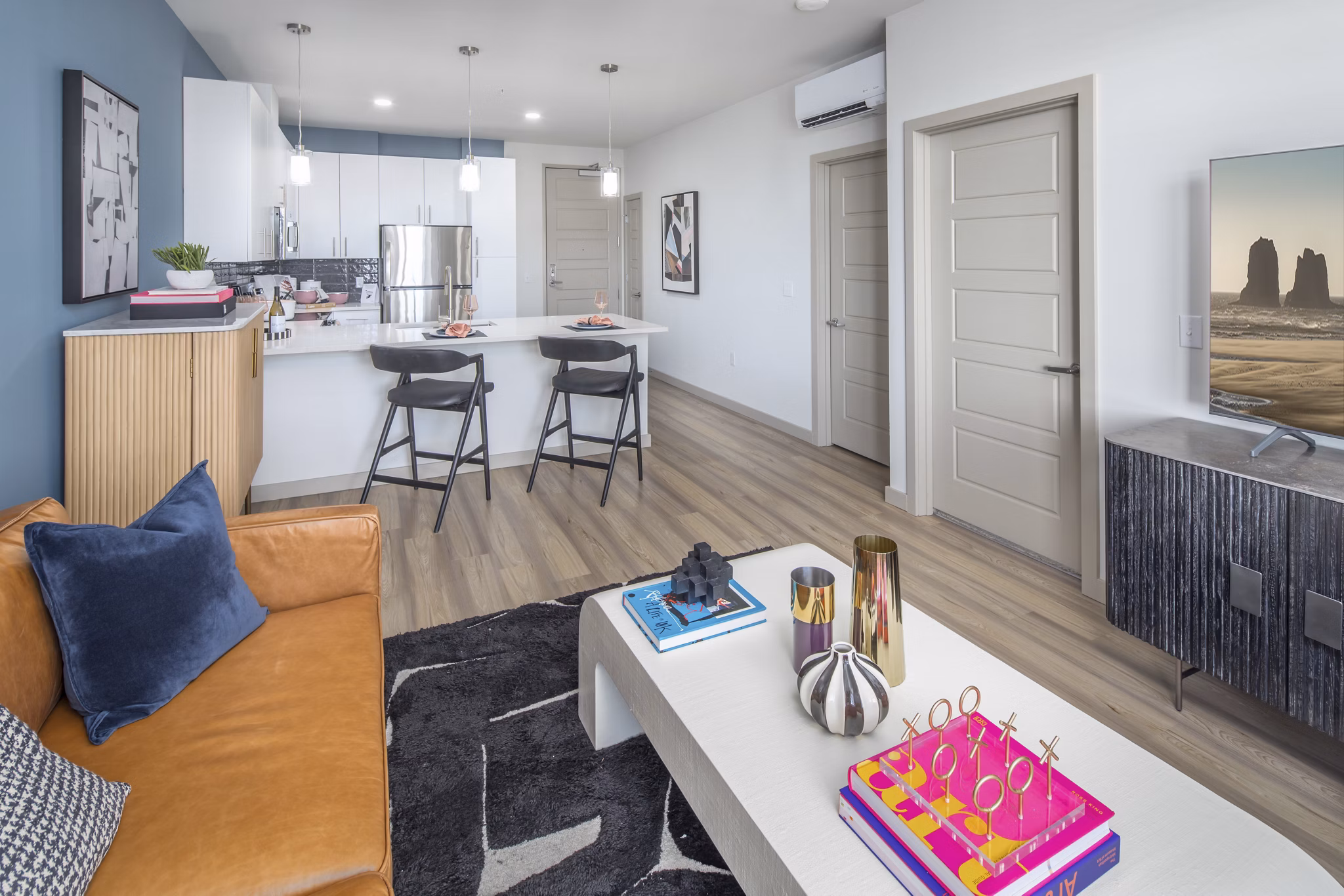 Spacious living room with modern decor at The Dylan Apartments
