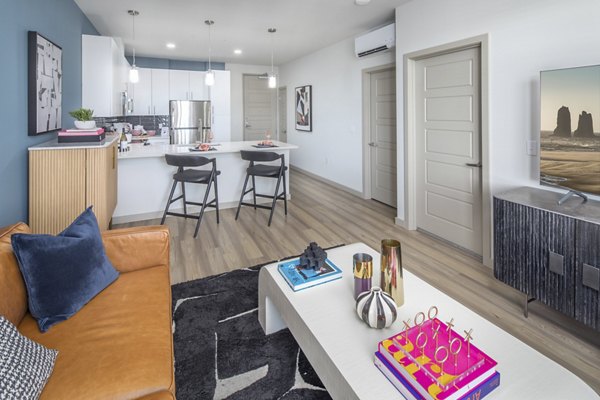 Spacious living room with modern decor at The Dylan Apartments