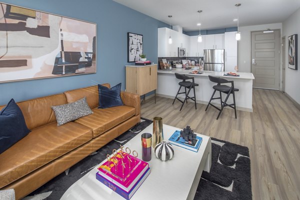 Spacious living room with modern furnishings at The Dylan Apartments