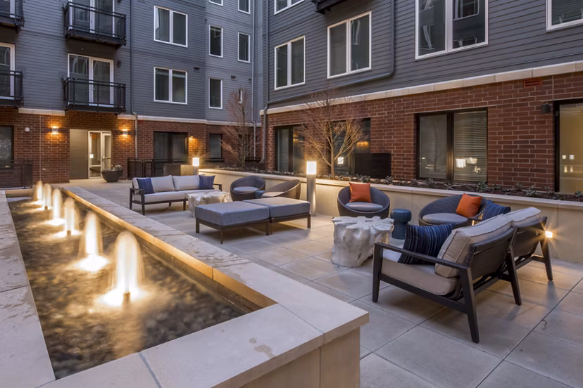 Cozy fire pit at The Dylan Apartments, perfect for luxury outdoor gatherings