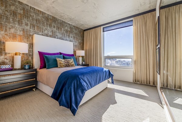 Bedroom featuring elegant design elements at The Waverly Apartments