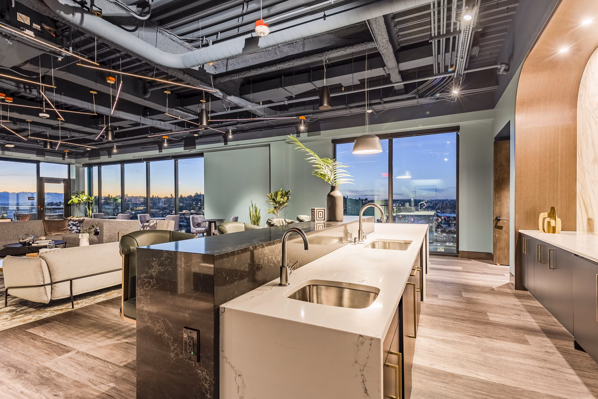 Clubhouse featuring modern decor and plush seating at The Waverly Apartments in Greystar's luxury living community