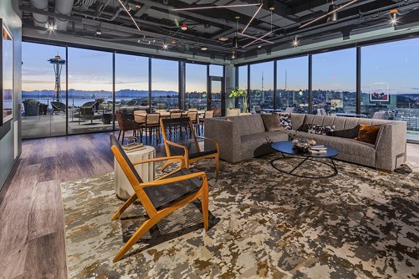 Elegant clubhouse with modern design elements at The Waverly Apartments, ideal for social gatherings and community events