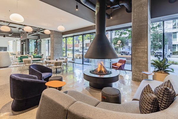 Clubhouse featuring modern furnishings and communal spaces at The Waverly Apartments, luxury living in Greystar community