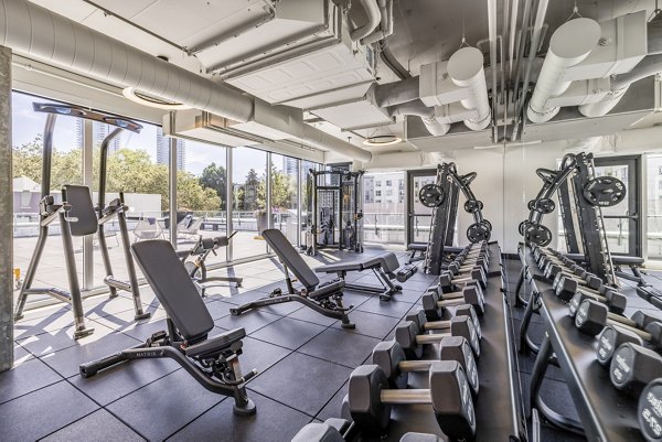 State-of-the-art fitness center with modern equipment at The Waverly Apartments, ideal for active lifestyles
