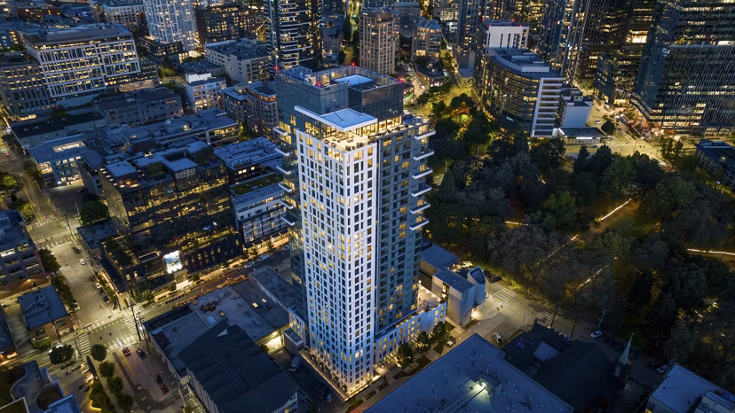 Waverly Apartments: Scenic view from luxury high-rise apartments in vibrant cityscape