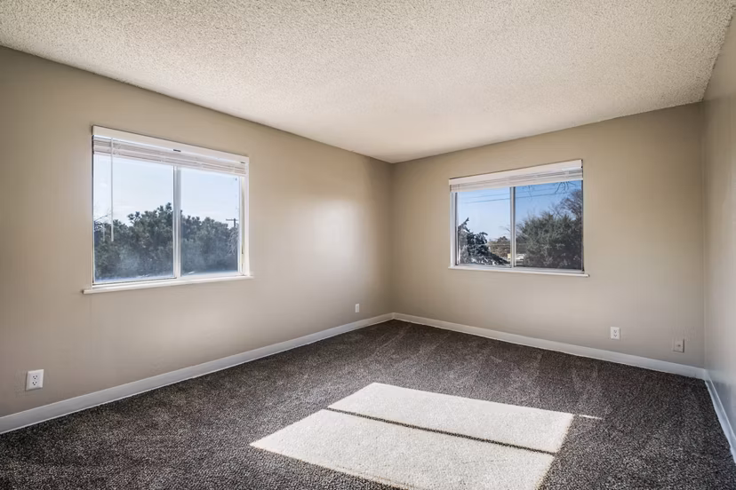 Inviting bedroom with modern decor at Calero Apartments